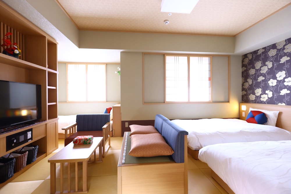 Superior, Triple, 1 Single and 2 Double Beds