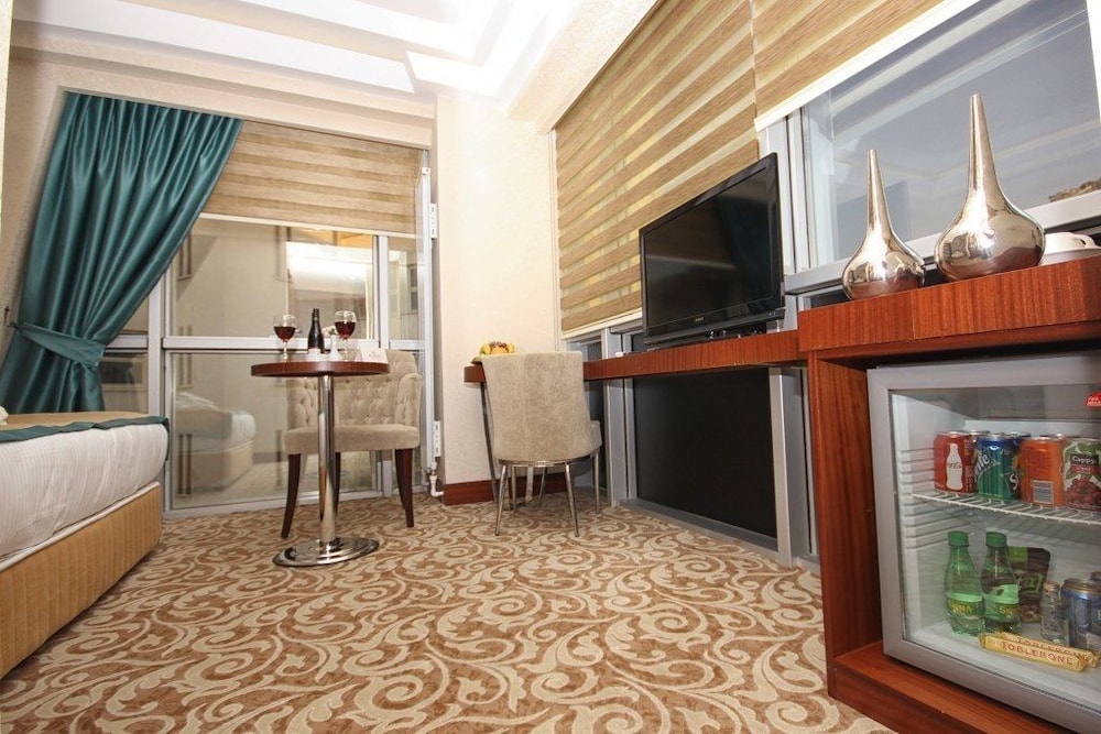 ASRIN BUSINESS HOTEL 61/73