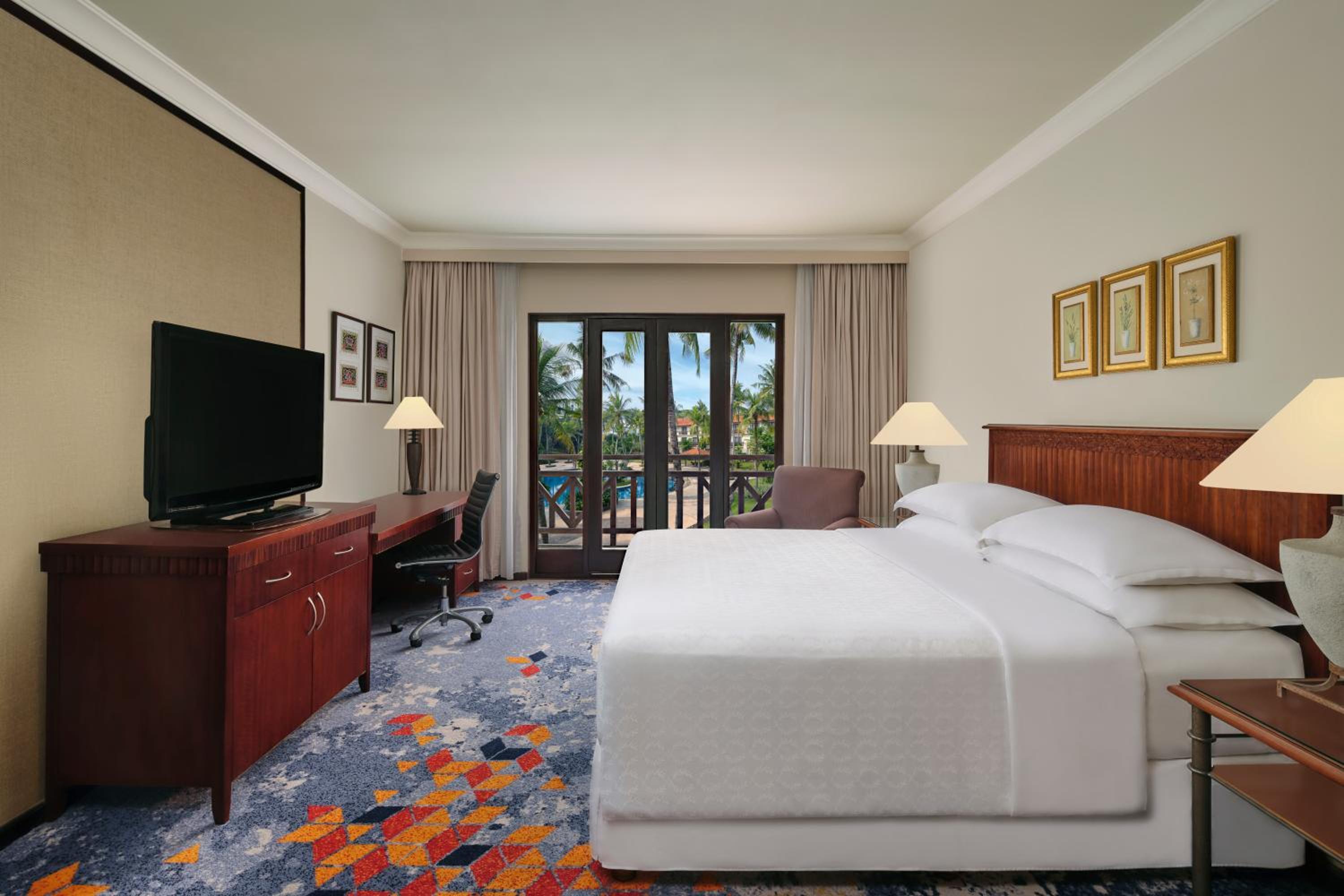 غرفة ديلوكس بسريرين منفصلين بإطلالة على الحديقة بشرفة