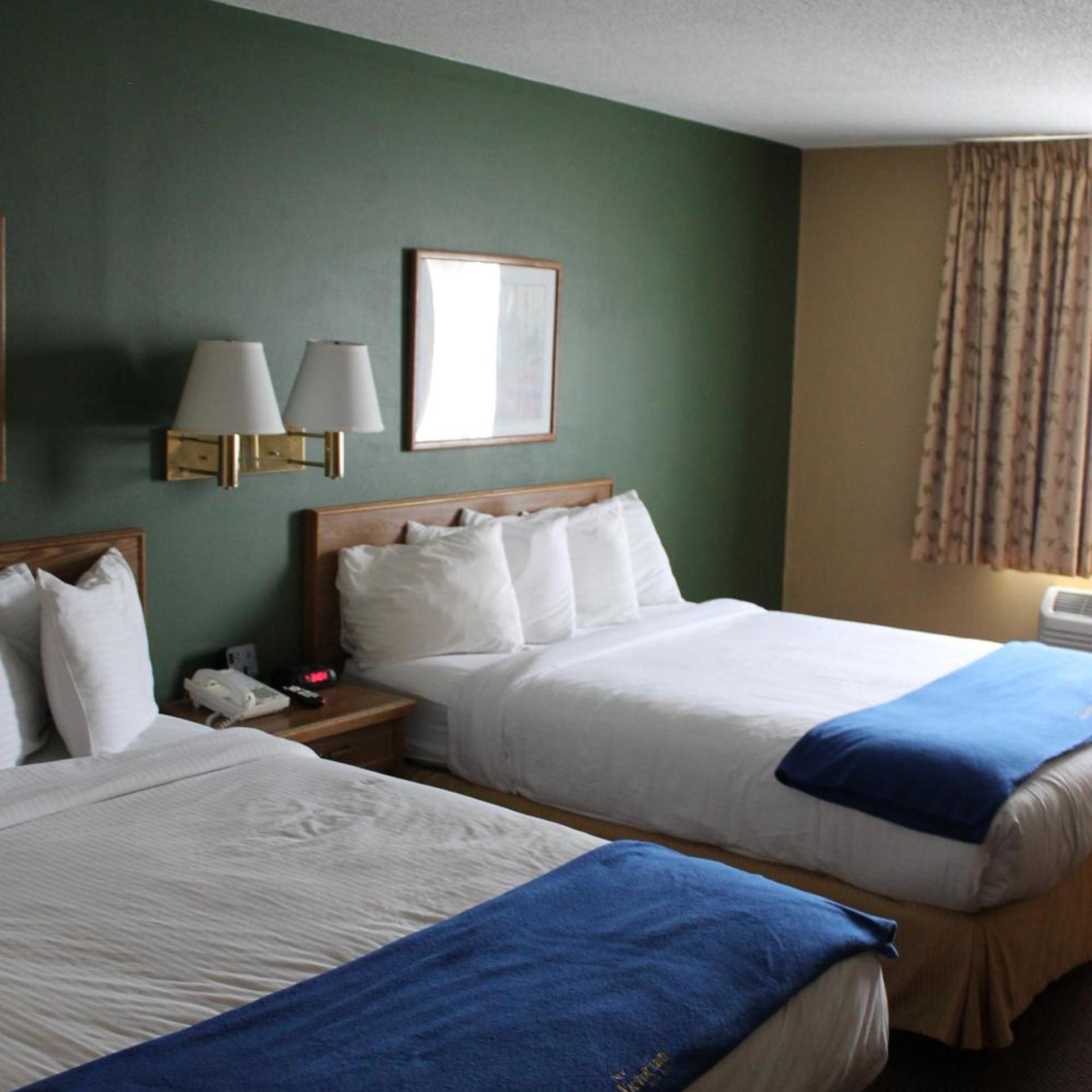غرفة بسريرين كوين، New Victorian Inn and Suites 5/7