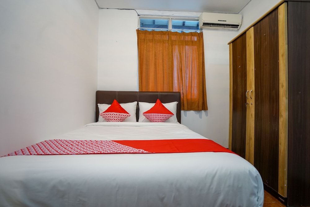 Super OYO 1844 Bravo Residence 17/39