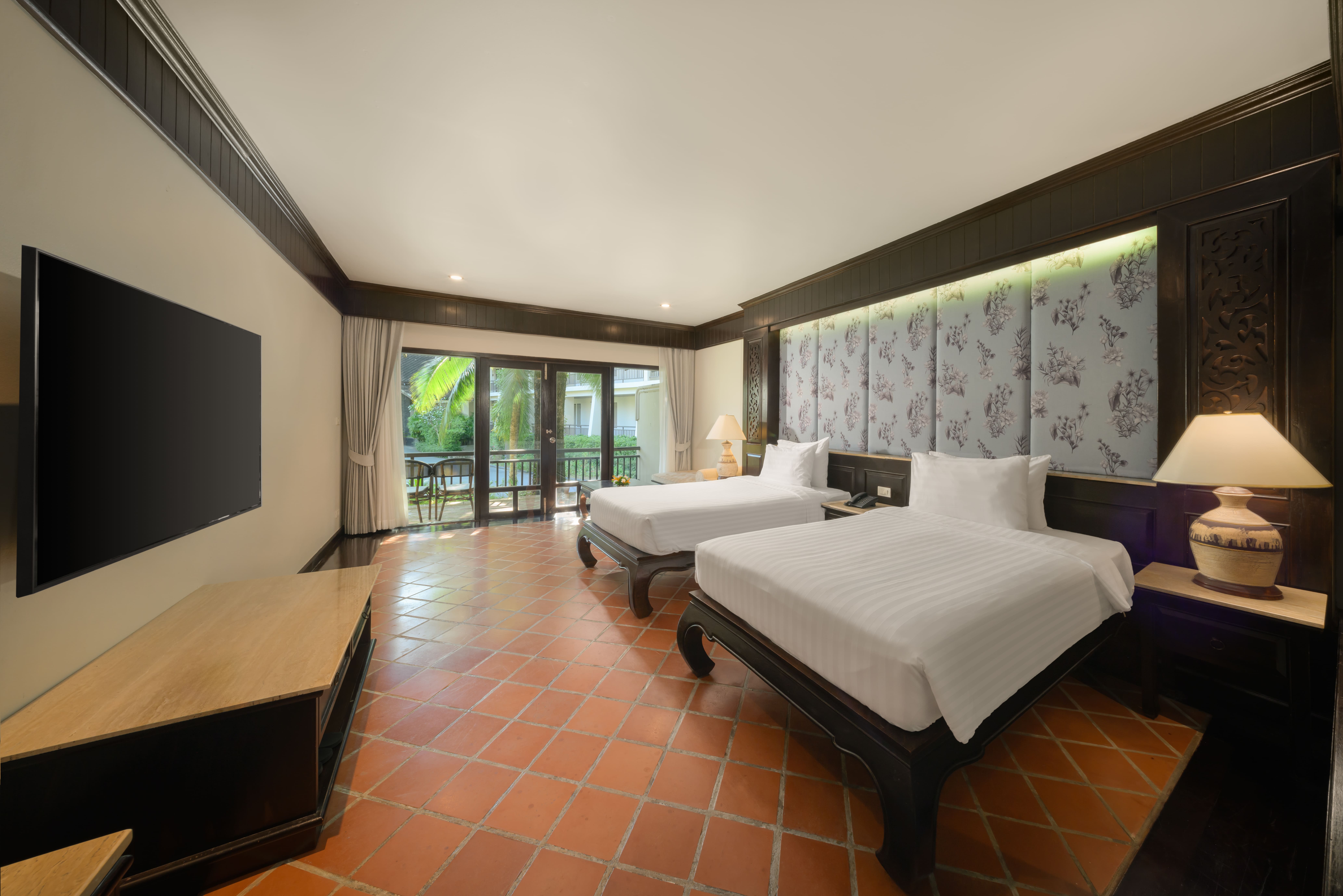 Deluxe Garden Room، The Hotspring Beach Resort and Spa 3/8
