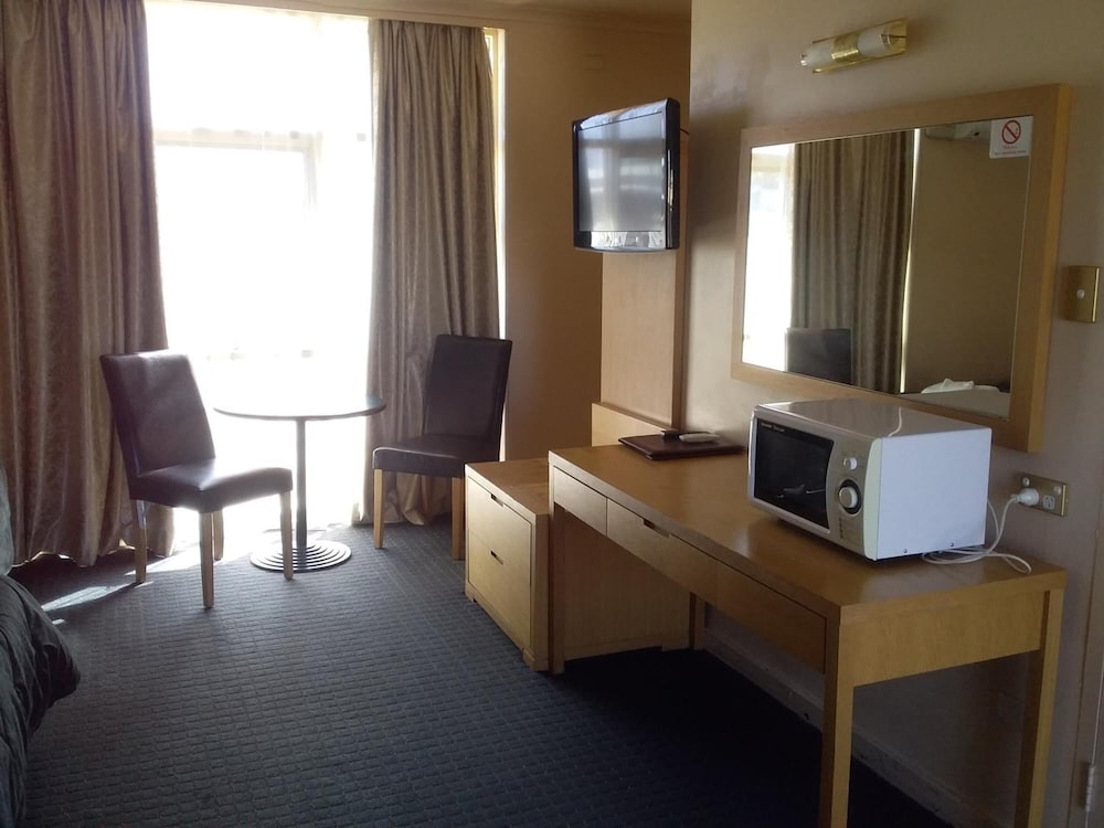 DESERT SAND MOTOR INN 20/25