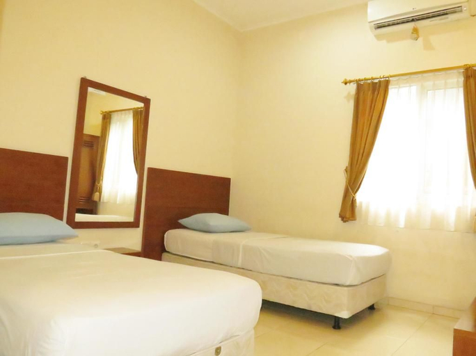 Wisma Tamu UKSW 7/11
