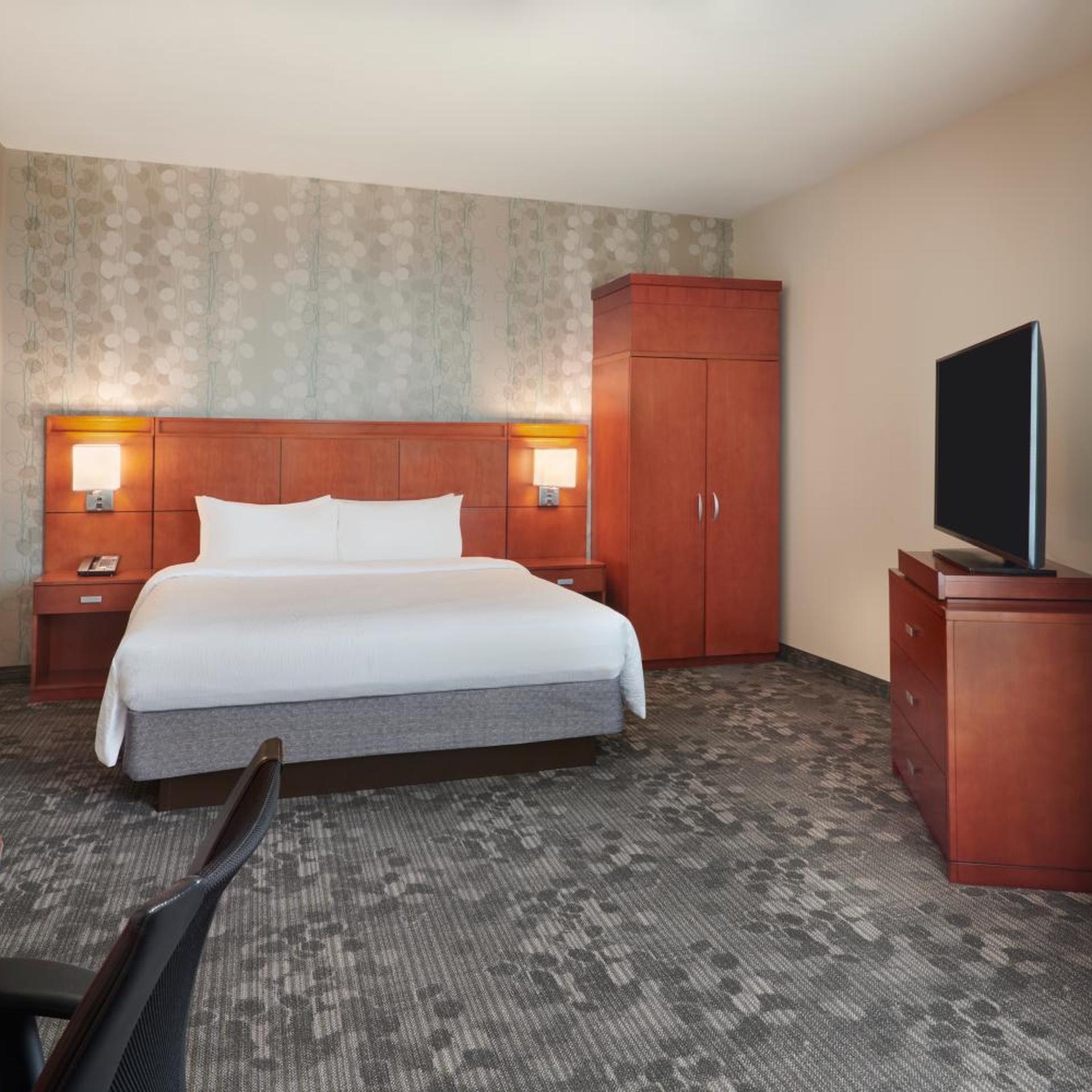 Executive, Studio, Suite, King Bed, Stadium View, Sofa