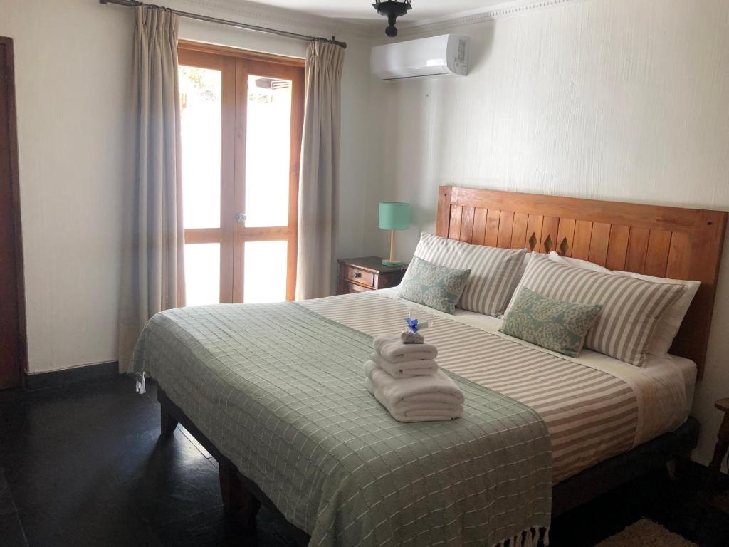 غرفة بسرير مزدوج مع سرير إضافي، Hotel Casa Arrayan 2/3