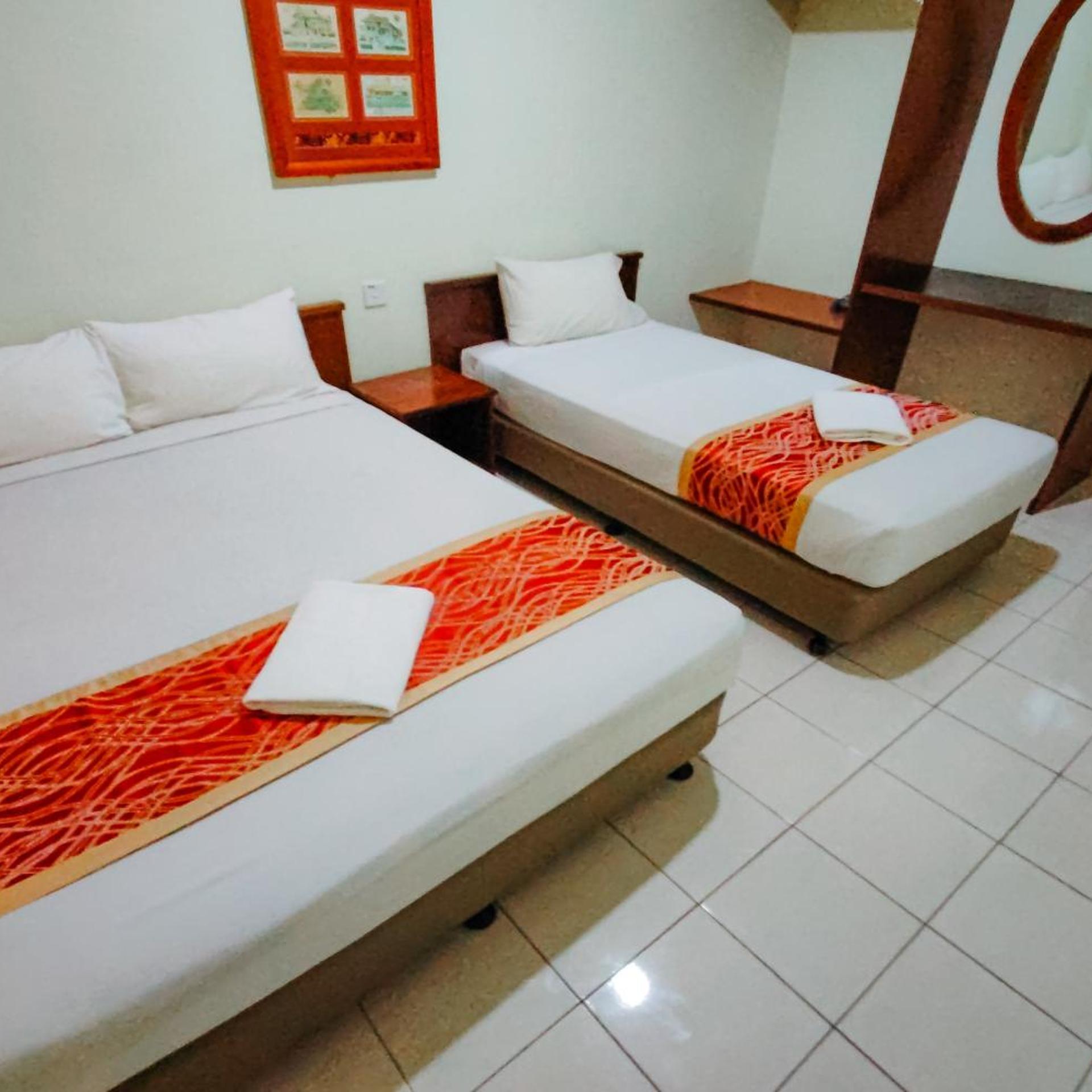 شقة بسرير فردي وسرير كوين بغرفة نوم واحدة، Virgo Batik Resort 4/8