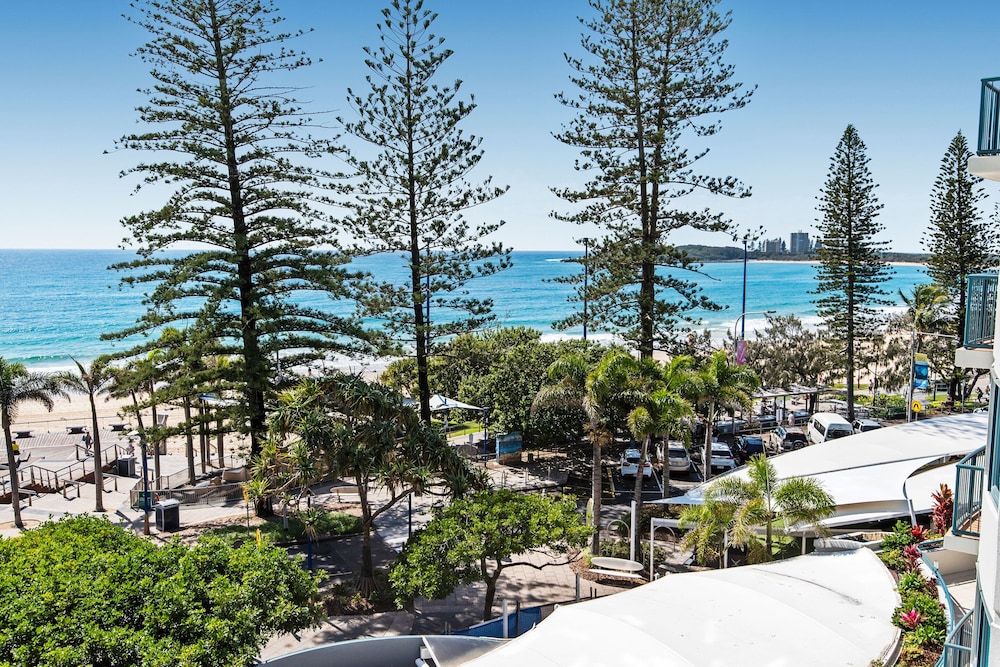 PENINSULAR BEACHFRONT RESORT 63/69