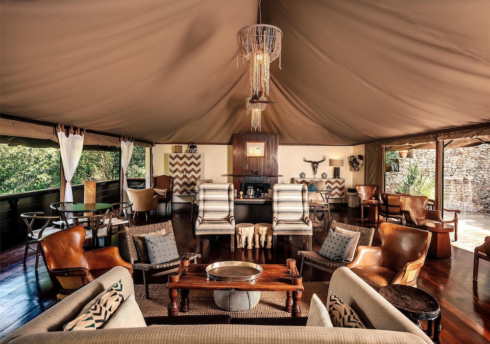 OLARE MARA KEMPINSKI MASAI MARA 32/50