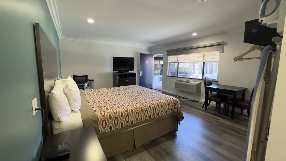 Garden Inn Suites 16/55