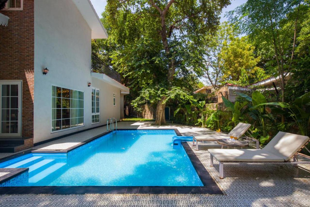 ELIVAAS Varsha Greens A 4-BHK Retreat with Private Pool & Outdoor Patios 15/20
