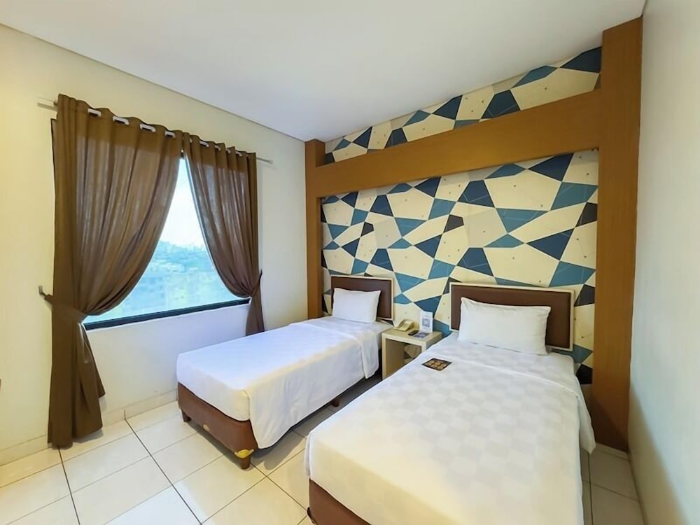 غرفة ديلوكس بسريرين منفصلين، Hotel 88 Jakarta - Mangga Besar VIII 3/3