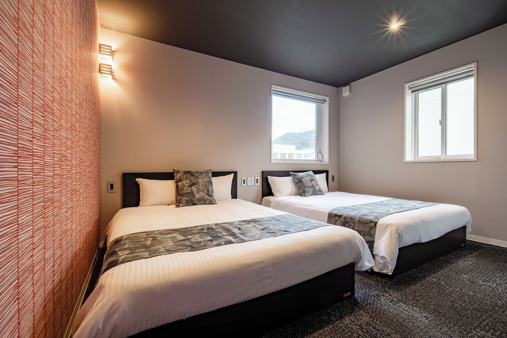 غرفة سوبيريور بسريرين مزدوجين مع أريكة