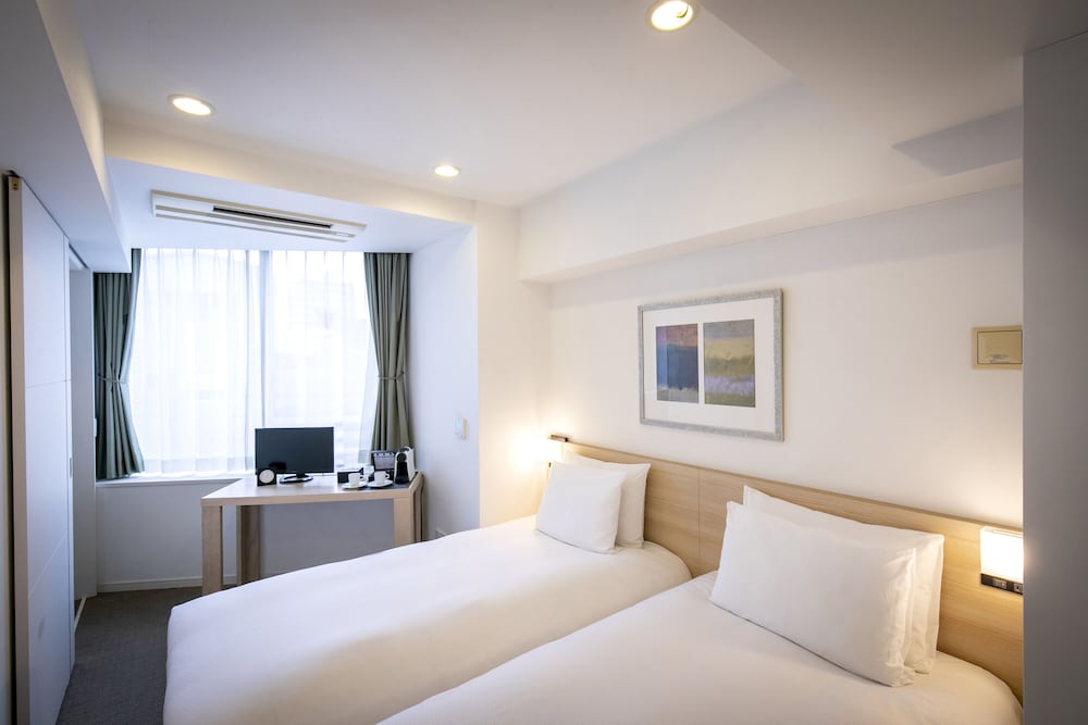 SUITE, TWIN BEDS, WITH EXTRA BED