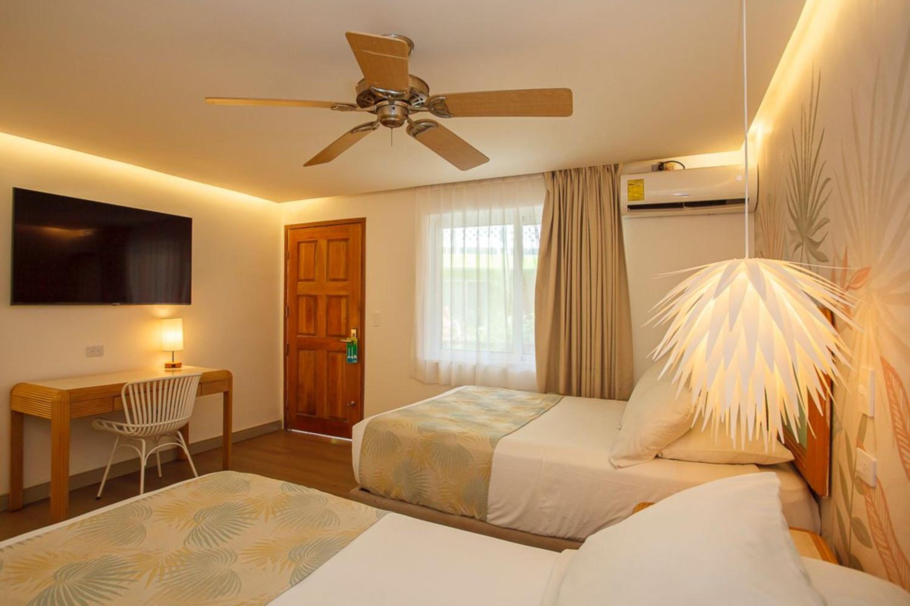 غرفة بسريرين مزدوجين، Hotel Cocoplum Beach 3/6