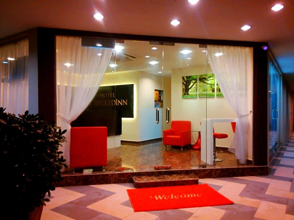 Capital O 90714 Hotel Checkedinn 12/38