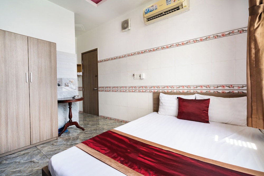 Collection O District 12 - Mau Tim Hotel 16/36