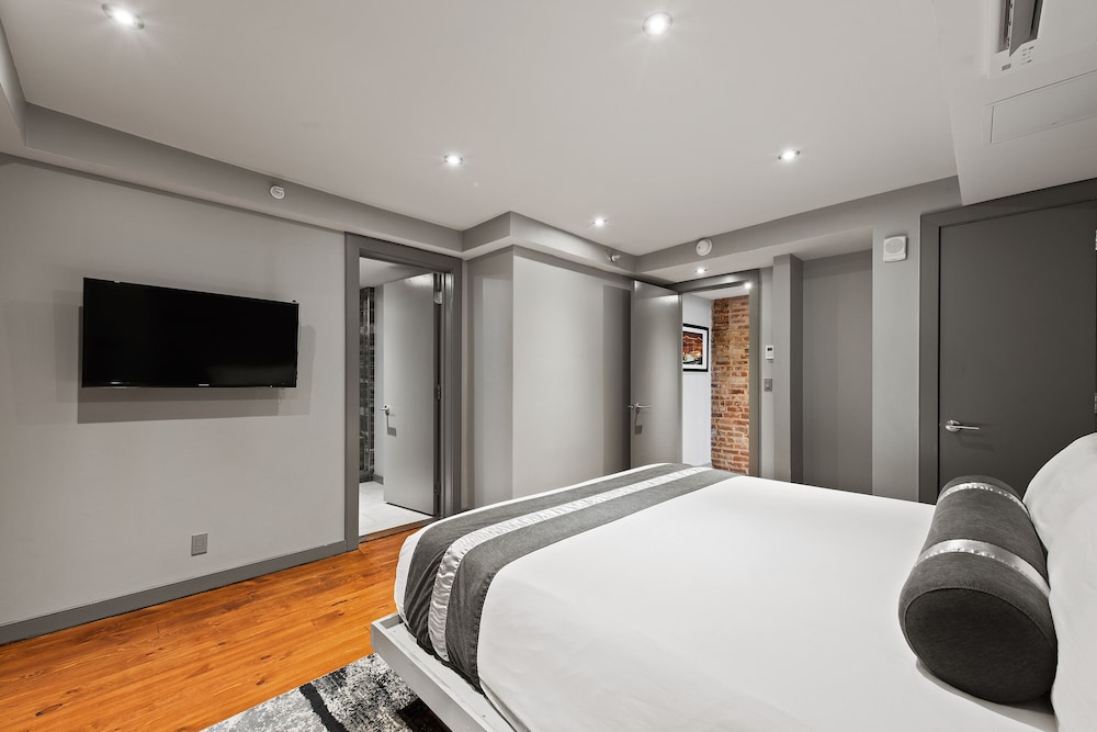 جناح بريميوم بسريرين كينج وسريرين كوين بـ4 غرف نوم مع أريكة، The Natchez Vacation Rentals 5/10