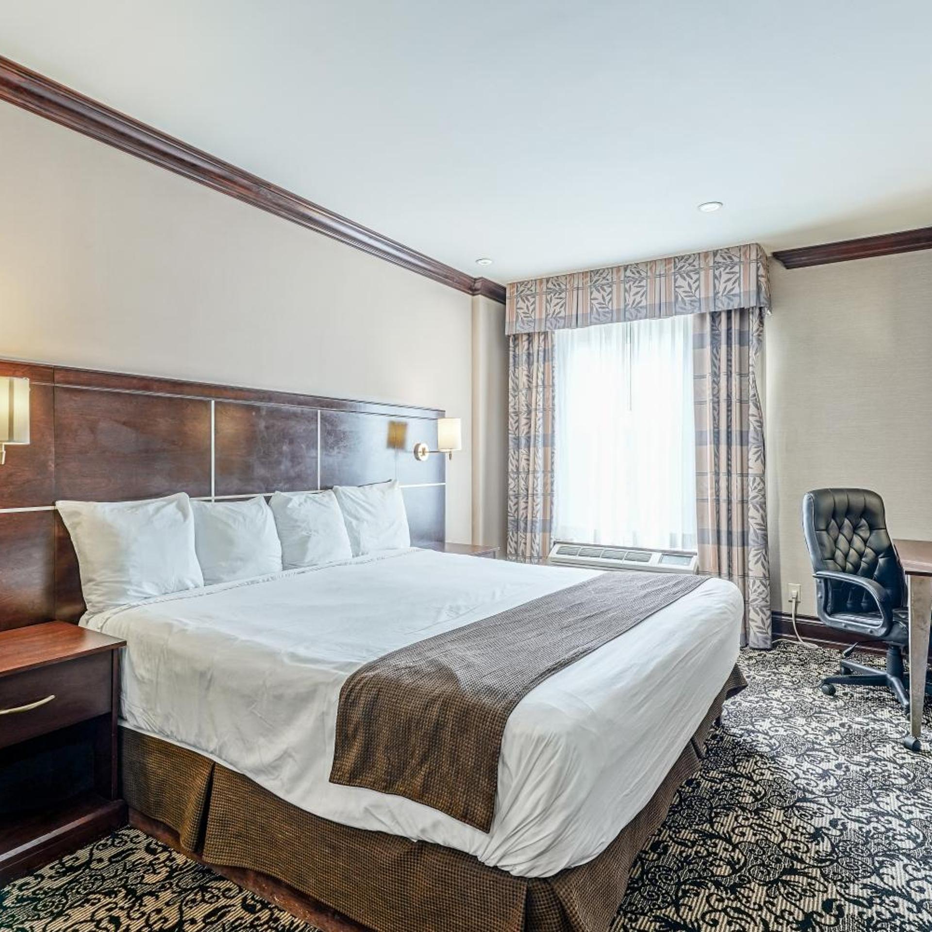غرفة بسرير كينج، Woodbine Hotel and Suites 2/8