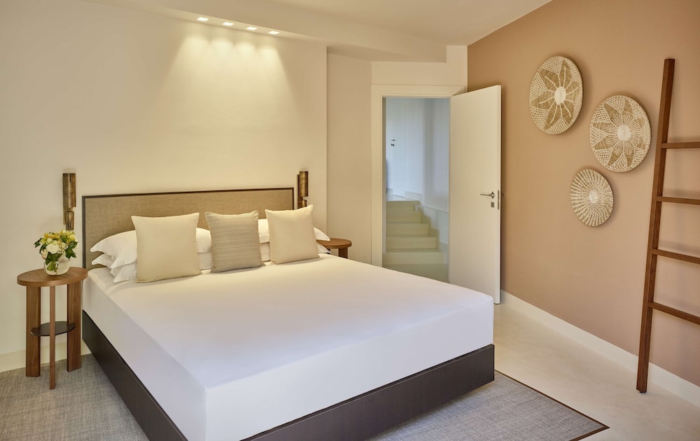 Room at Baia di Chia Resort Sardinia, Curio Collection by Hilton, DOMUS DE MARIA