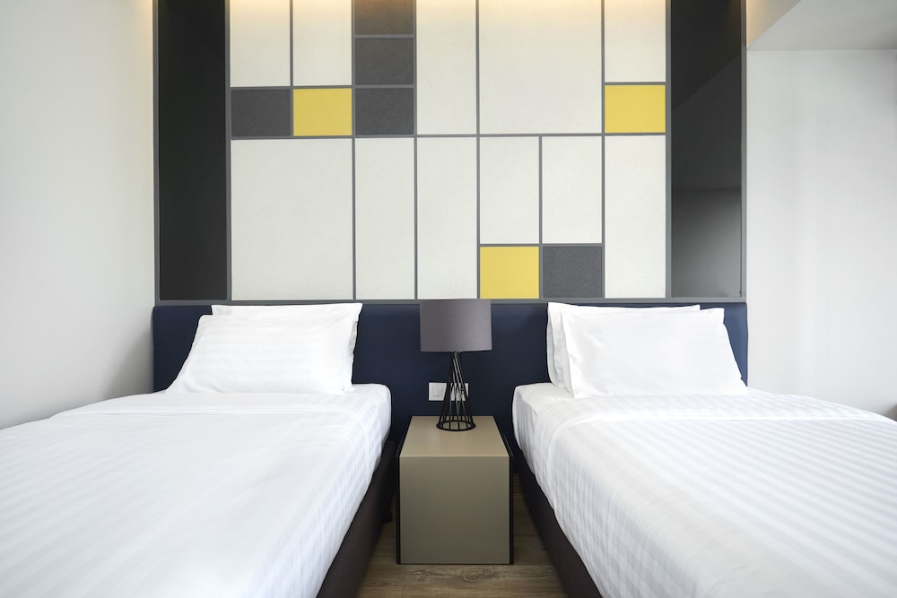 غرفة ديلوكس بسريرين منفصلين بشرفة