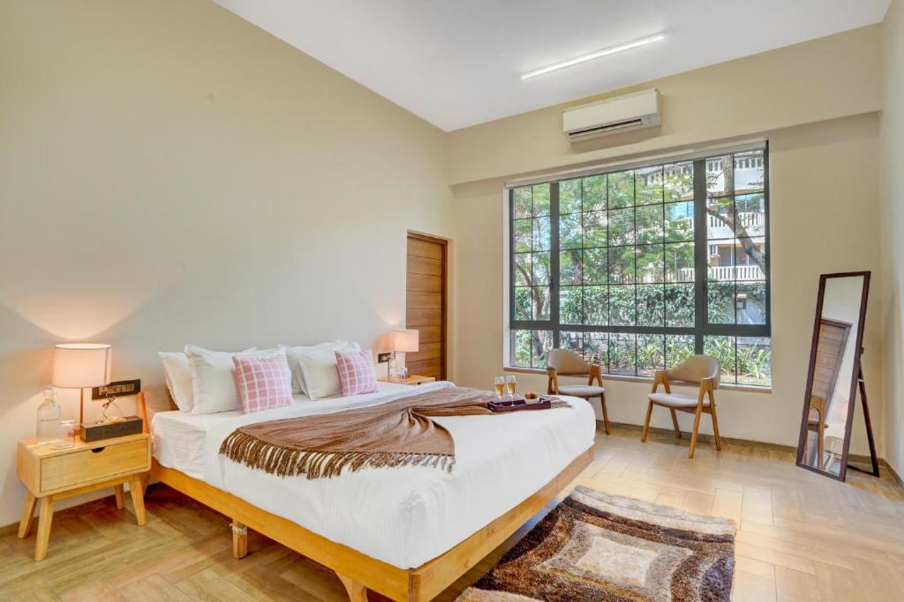 Room at ELIVAAS Villa 39 Serene 6 BHK Retreat with Pvt Pool, Gaming Zone & Balcony, LONAVALA