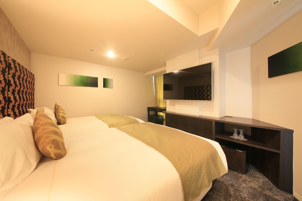DELUXE, 2 DOUBLE BEDS, WITH EXTRA BED