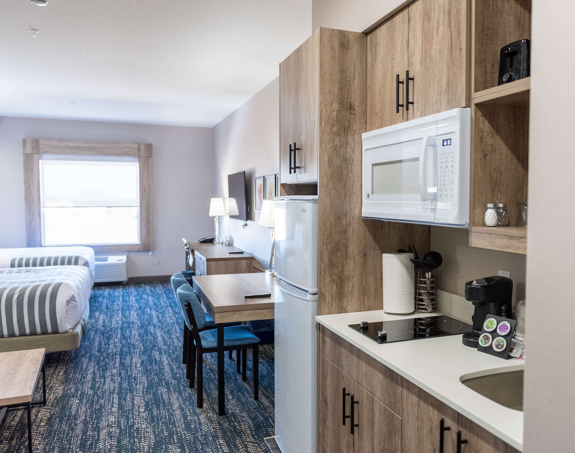 جناح تنفيذي كبير بسرير كينج مع أريكة بمطبخ، Best Western Premier Executive Residency Medicine Hat 9/10