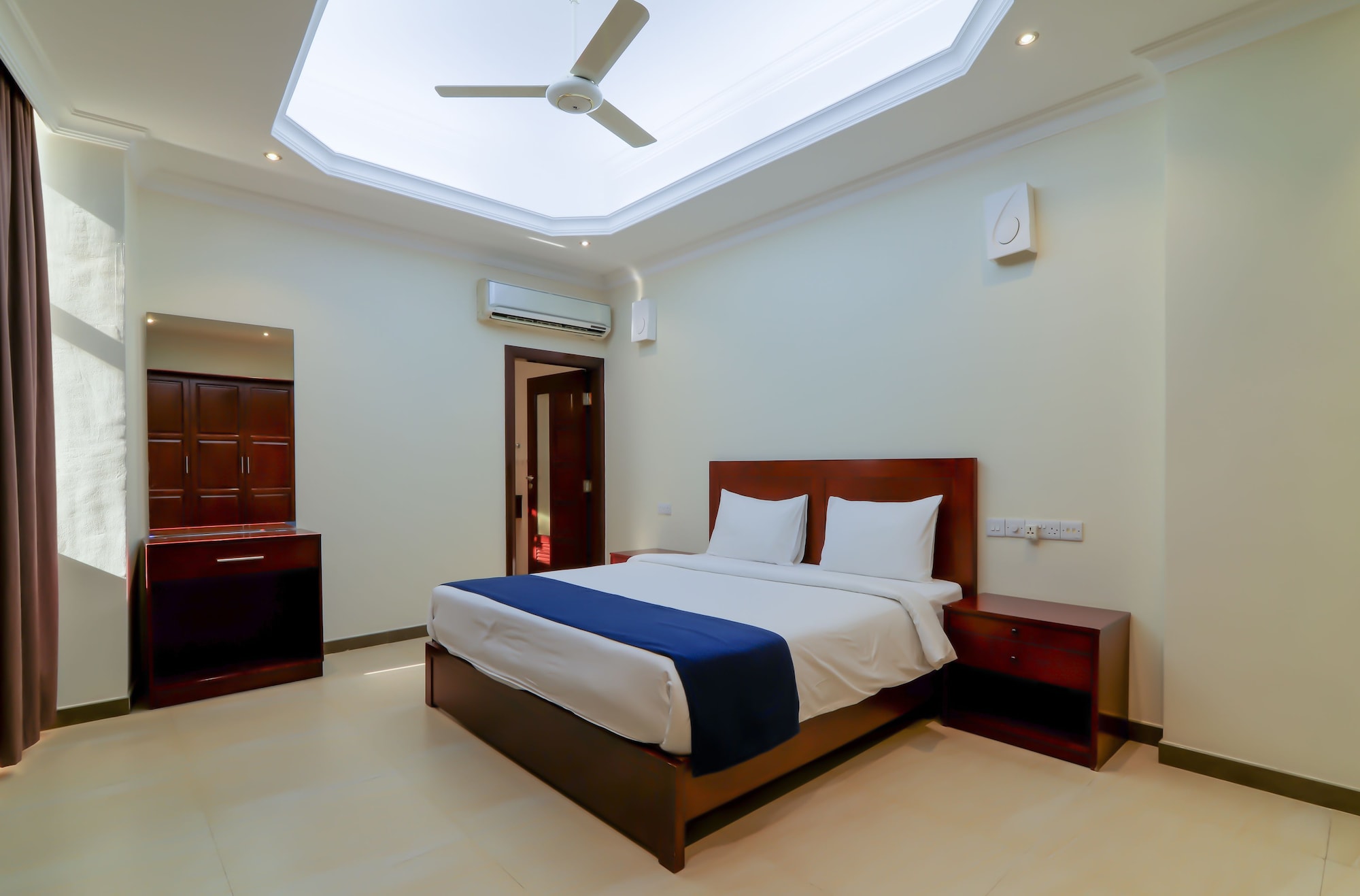 جناح عائلي بسريرين كوين وسريرين منفصلين، Tanzanite Executive Suites 3/7