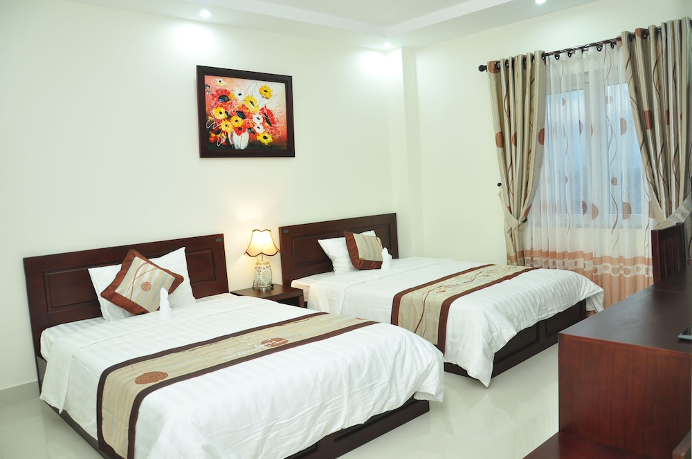 غرفة ديلوكس رباعية بسريرين مزدوجين، Da Nang Port Hotel 4/4