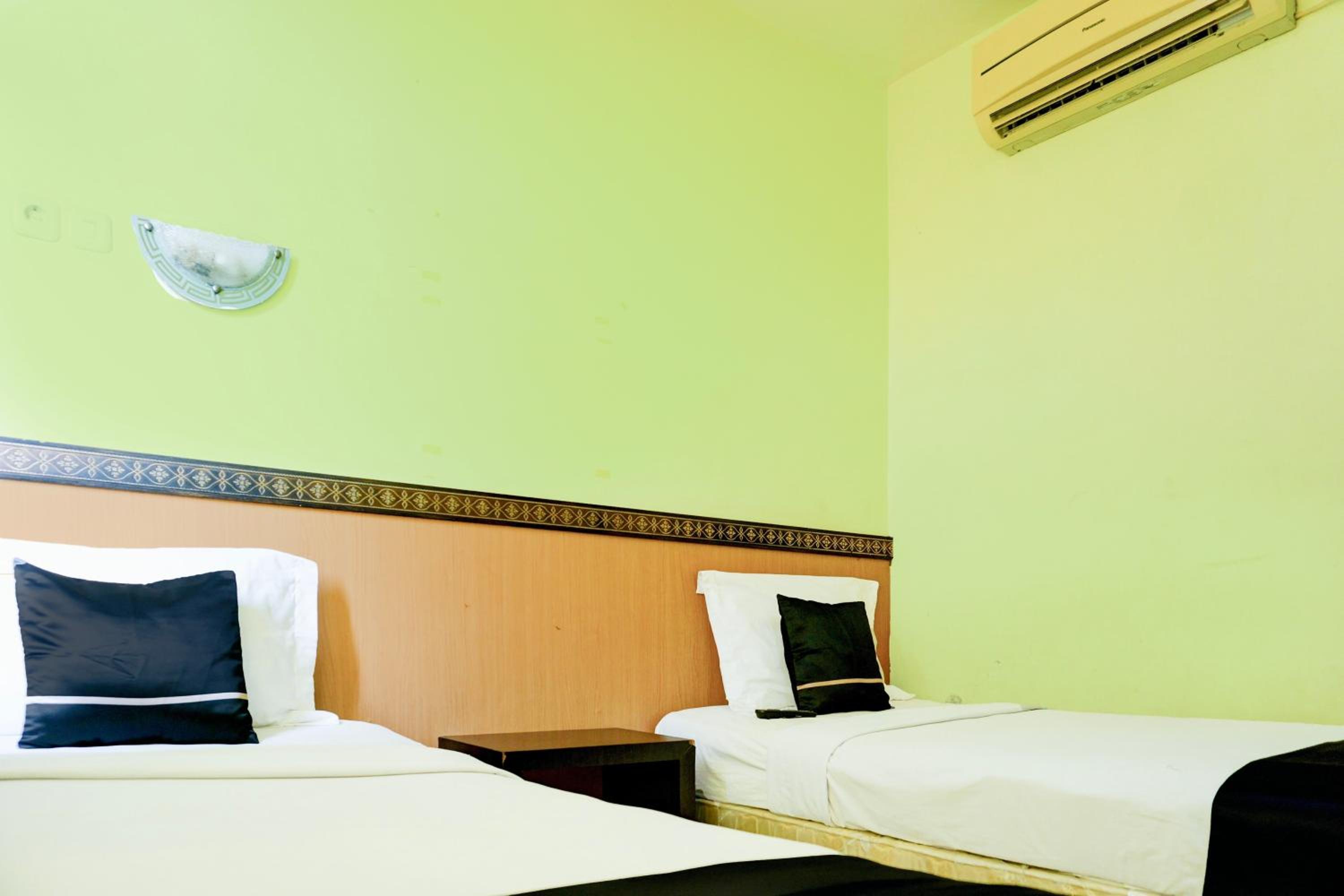 غرفة قياسية بسريرين منفصلين، OYO 2255 Hotel Aifih 3/9