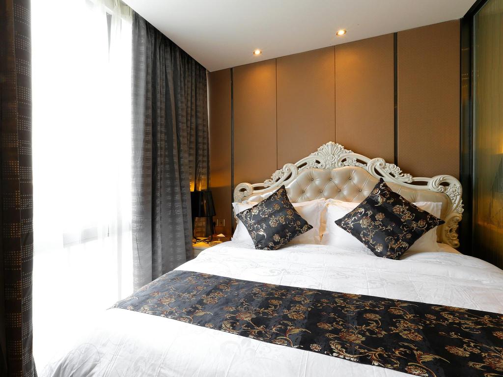 جناح تنفيذي بسرير كينج بغرفة نوم واحدة، Pengman International Apartment Hotel (Beijing Road Jiedeng Duhui) 7/10