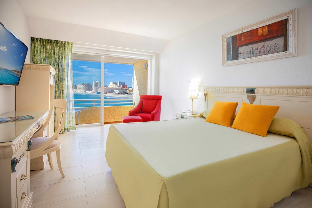 غرفة بإطلالة على البحر بشرفة مفردة بسريرين منفصلين، Hotel Servigroup Galua 3/10