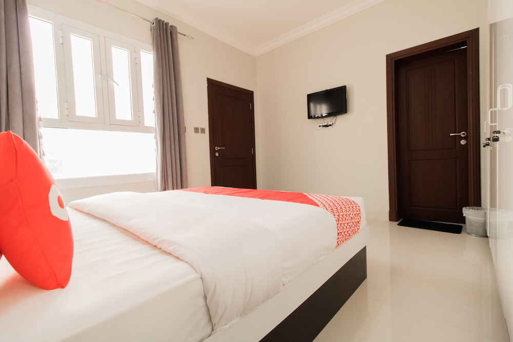 Super OYO 106 Muscat Grand Hotel Apartment 8/21
