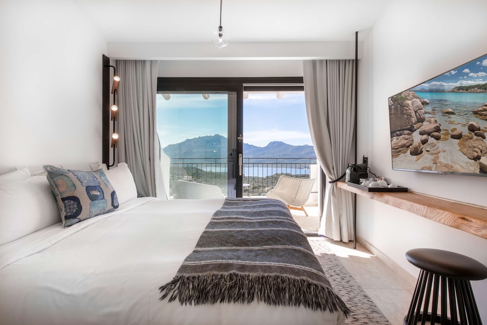 Sulia House Porto Rotondo, Curio Collection by Hilton 35/99