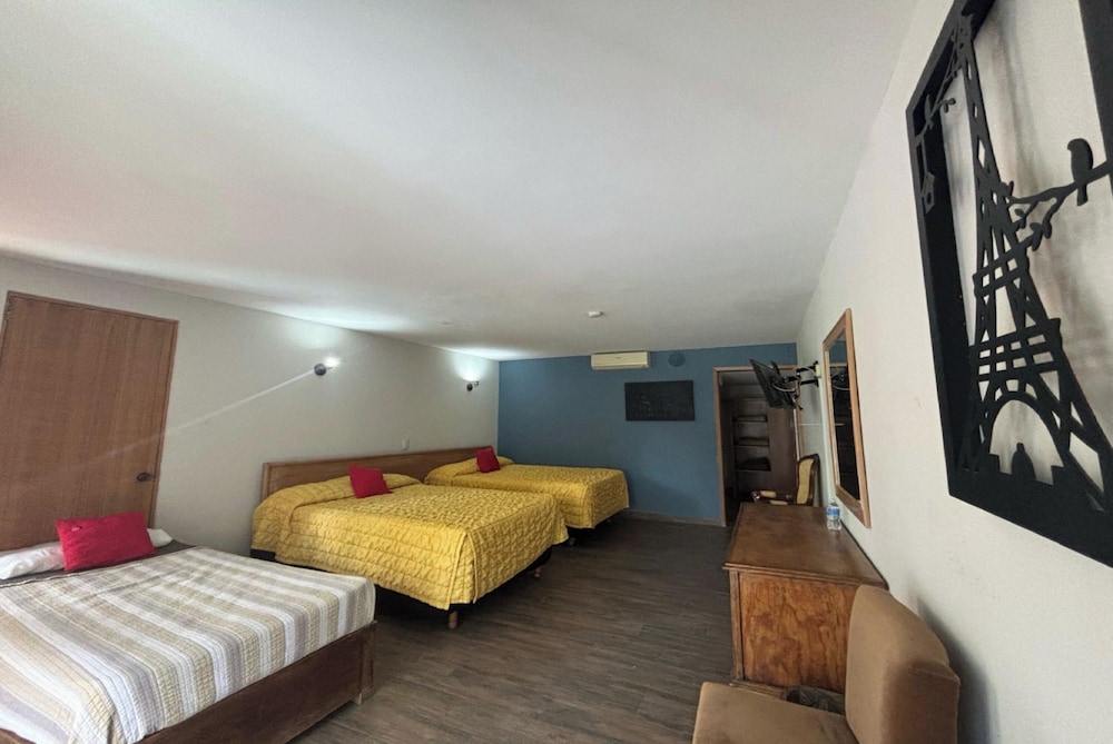 Standard, Quintuple, 1 Single and 2 Double Beds