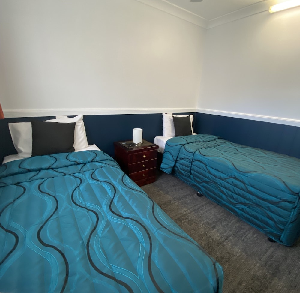 Downstairs, 2 Bedrooms, 1 Queen and 3 Single Beds