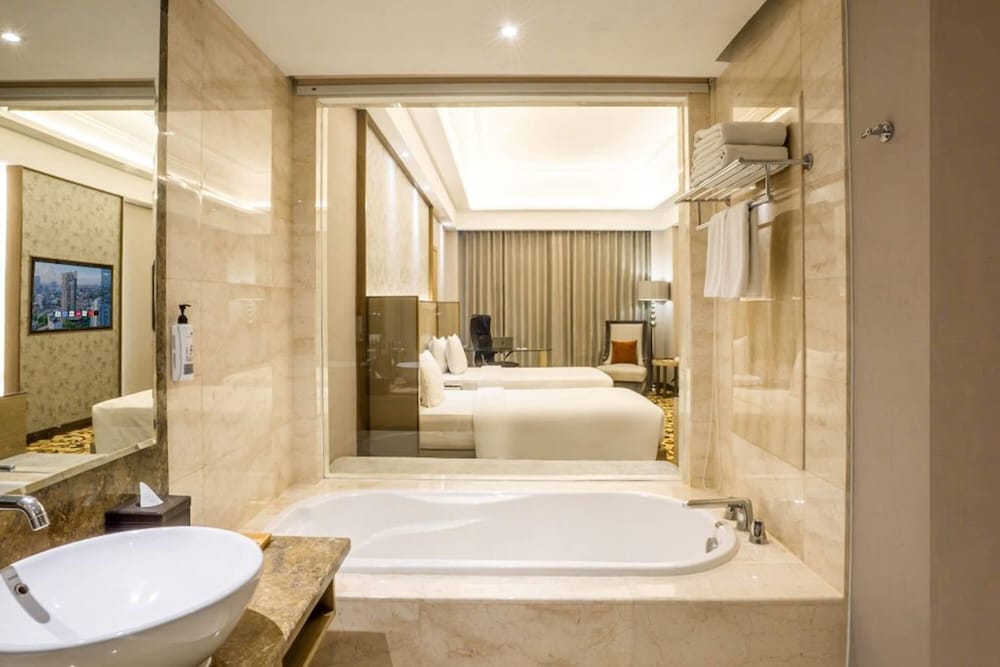 غرفة ديلوكس بسريرين منفصلين، Wyndham Surabaya City Centre 4/7