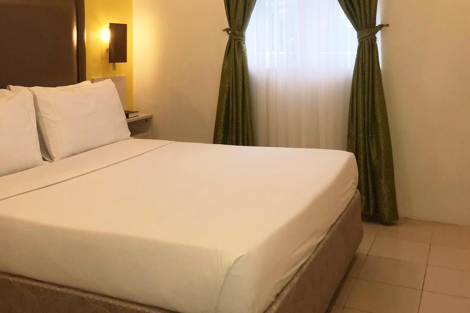 غرفة ديلوكس بسرير كينج وسرير كوين، Cebu Uncle Tom's Cabin Hotel 8/10