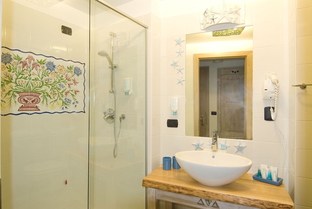 Hotel Resort And Spa Baia Caddinas 47/50