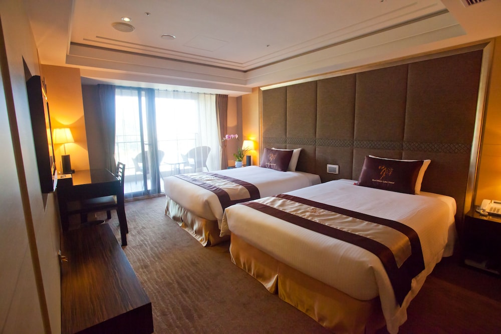 غرفة ديلوكس رباعية بسريرين مزدوجين بإطلالة على البحيرة، Sun Moon Lake Hotel 3/4