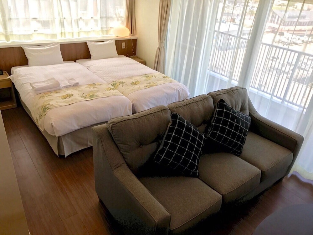 غرفة قياسية بسريرين منفصلين مع أريكة، Seaside Condominium Rana Chatan 8/10