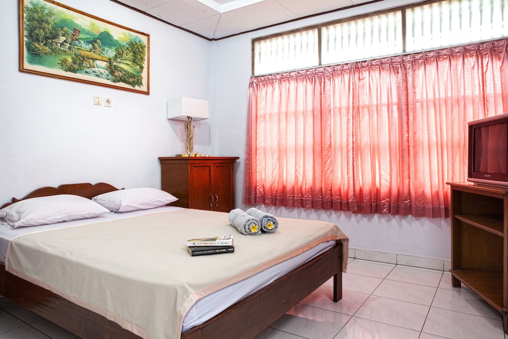 Palm Garden Kuta Hotel 3/15