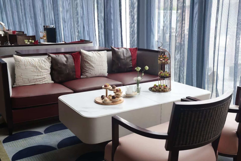 Gloria Plaza Hotel Dongsheng 33/42