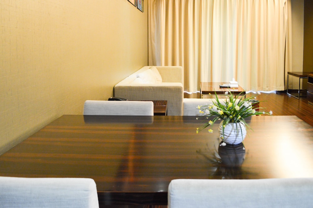 Xingyi International Hotel Poly Store 55/70