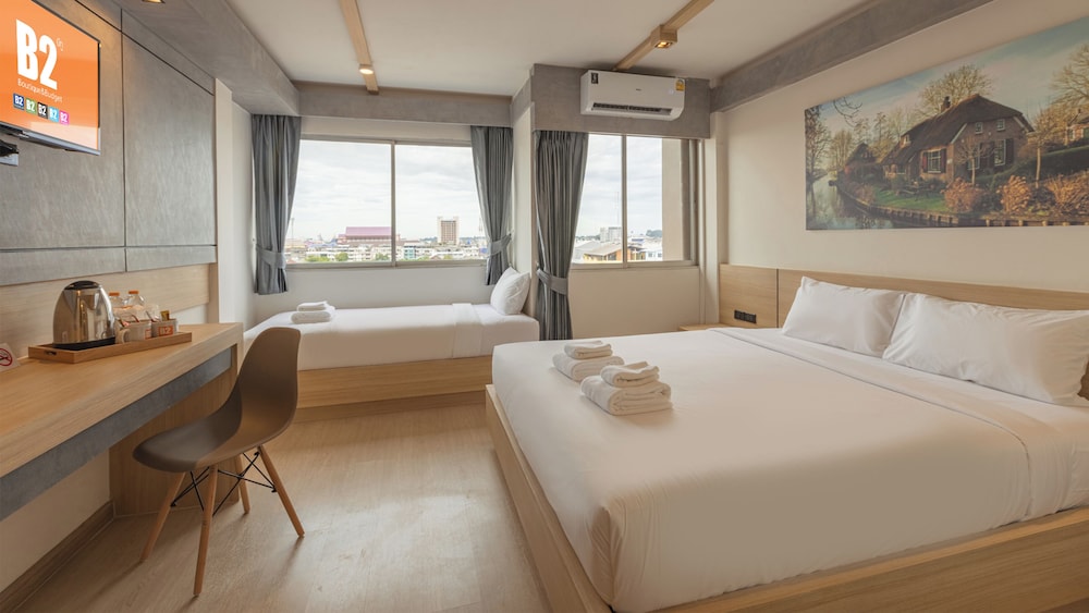 Deluxe, Triple, 1 Double and 1 Single Bed