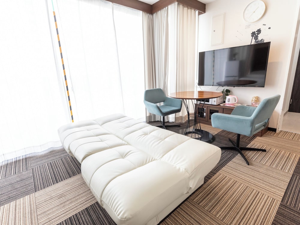 غرفة بسريرين منفصلين وسرير كينج بإطلالة على النهر، Sakuragawa Riverside Hotel 5/7