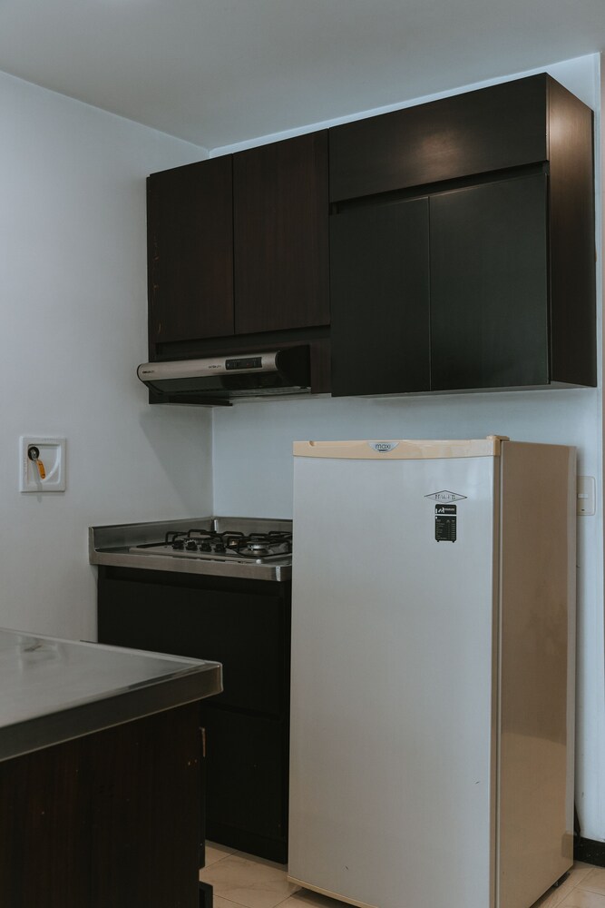 Travelers Apartamentos and Suites Orange Medellin 50/50
