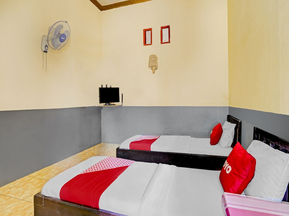 OYO 90405 Penginapan Sasti Kuningan 6/15