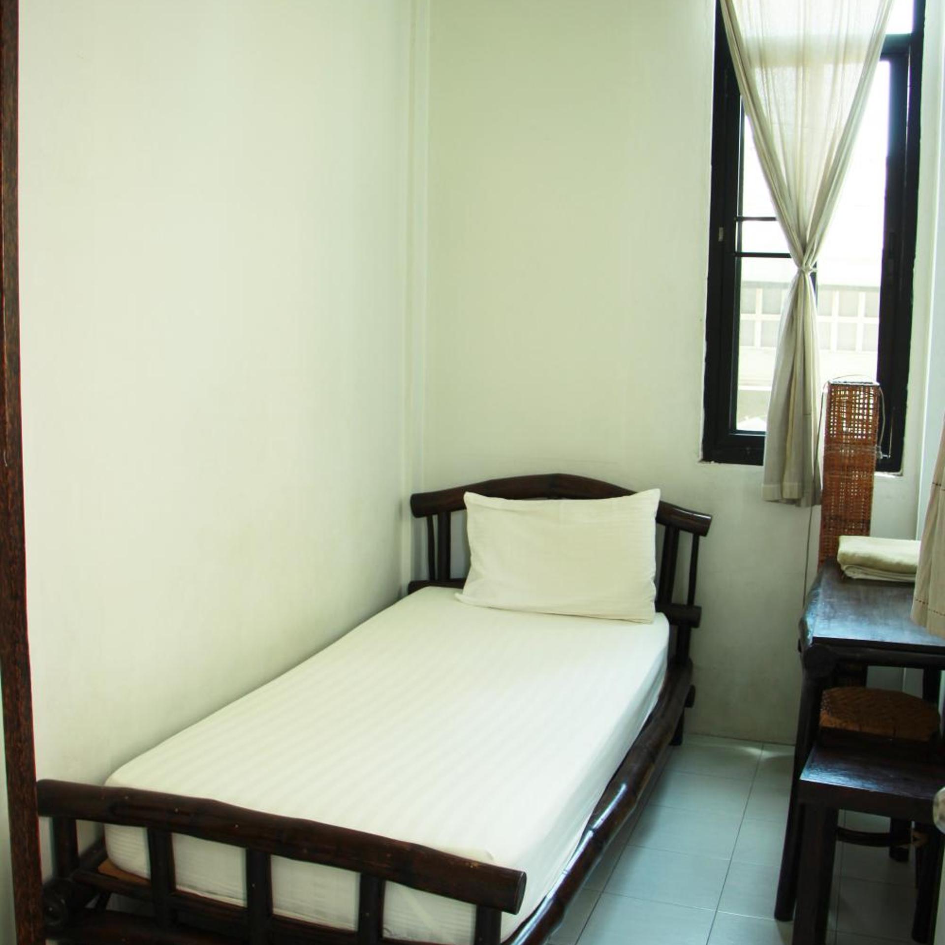 غرفة مفردة بحمام مشترك